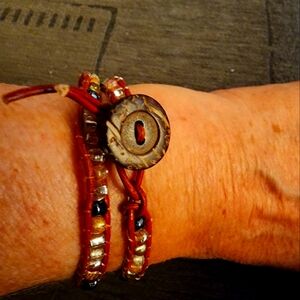 Handmade one of a kind leather & seed bead bracelet.